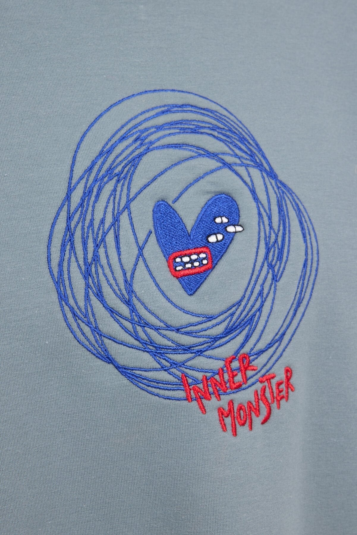 INNER MONSTER UNISEX T-SHIRT